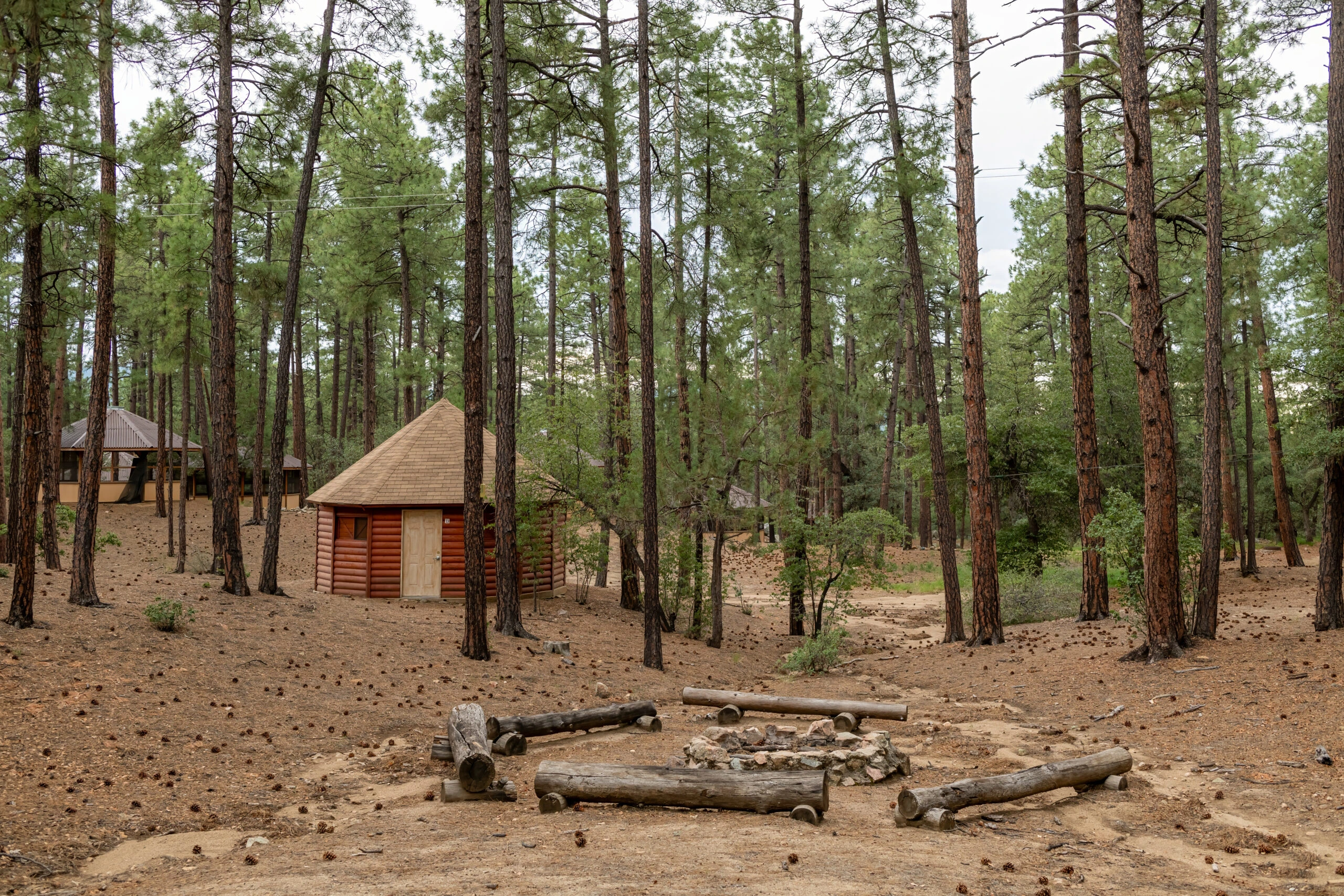a log cabin in the woods