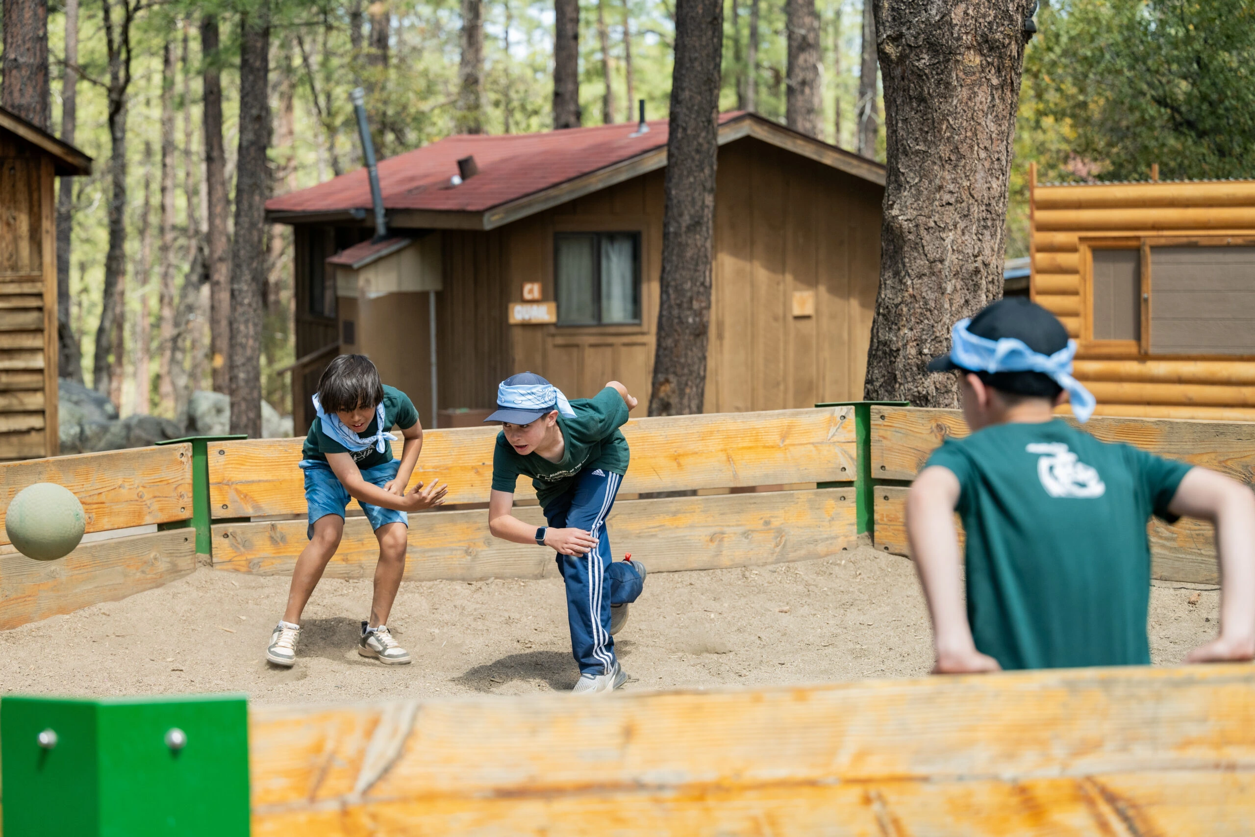 a group of kids playing in sand