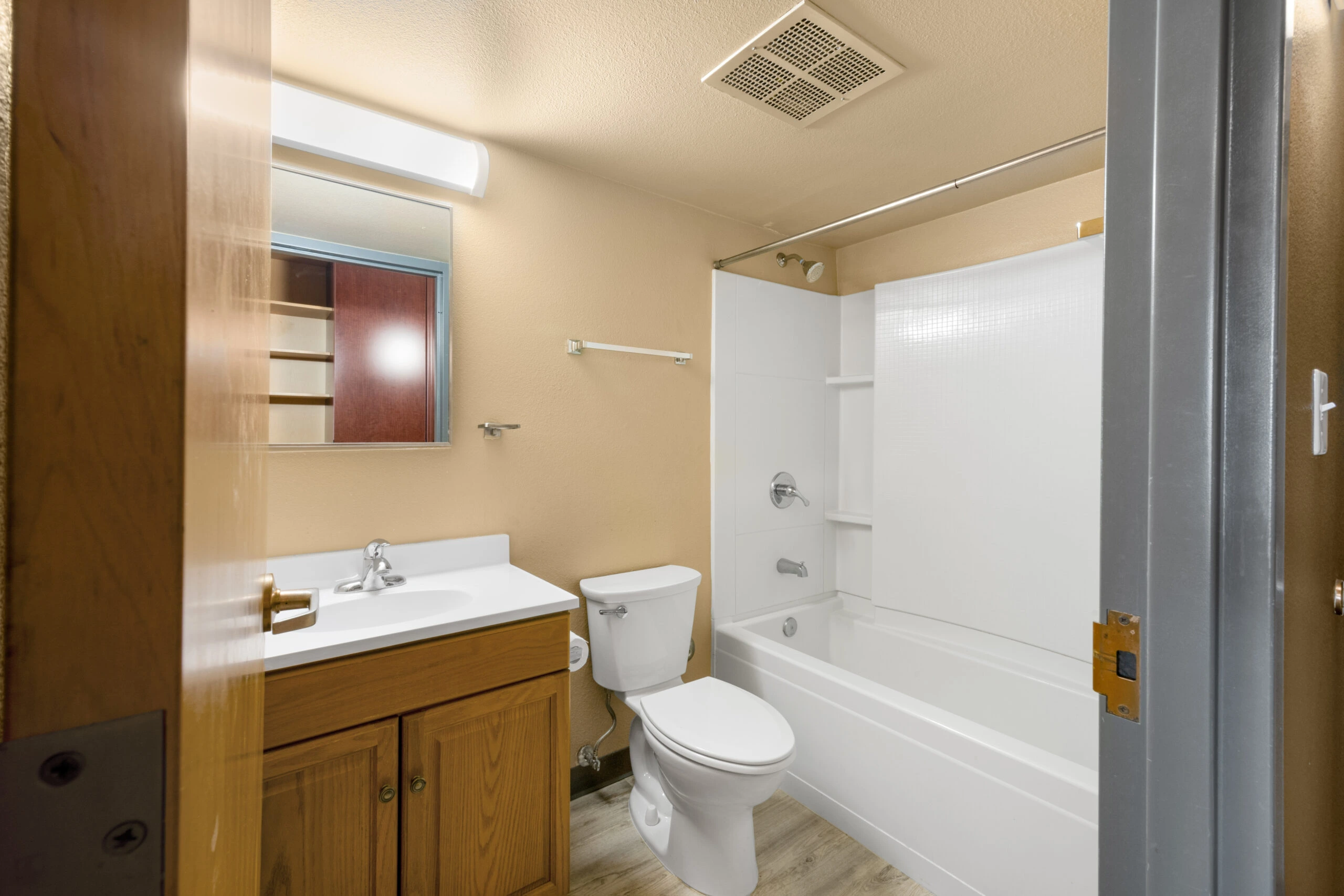 a bathroom with a toilet and sink