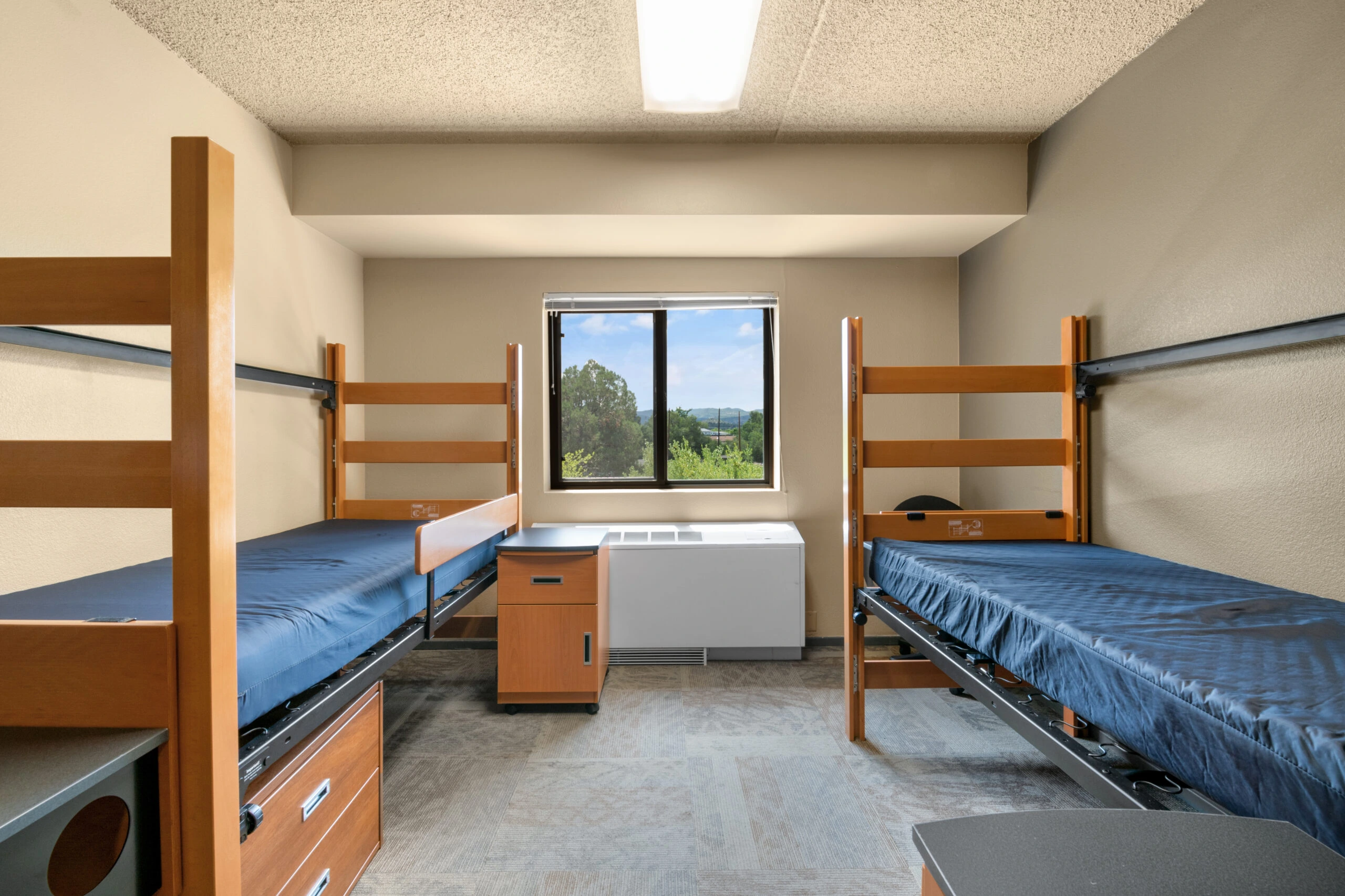 a room with two bunk beds