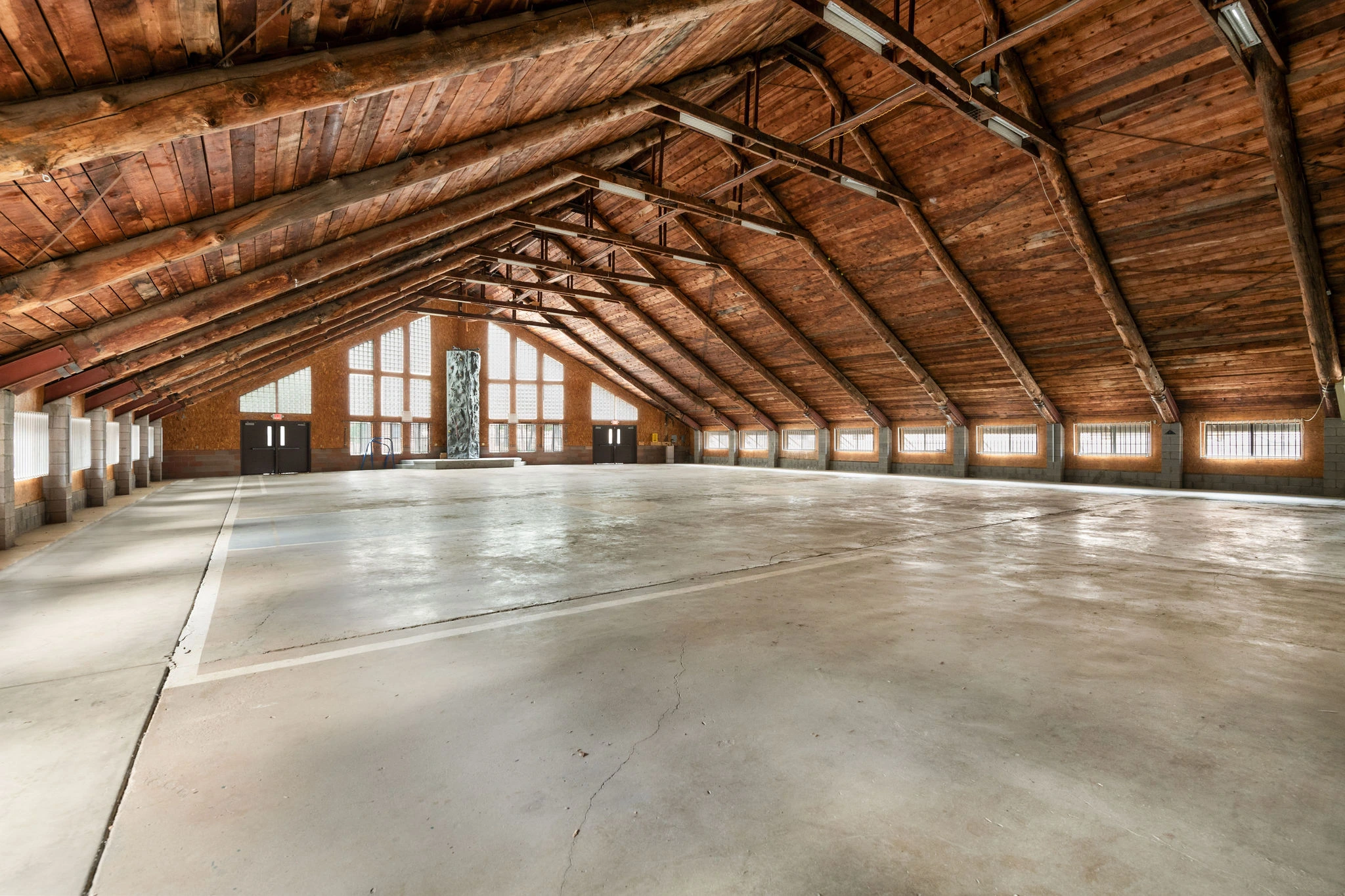 a large empty room with windows