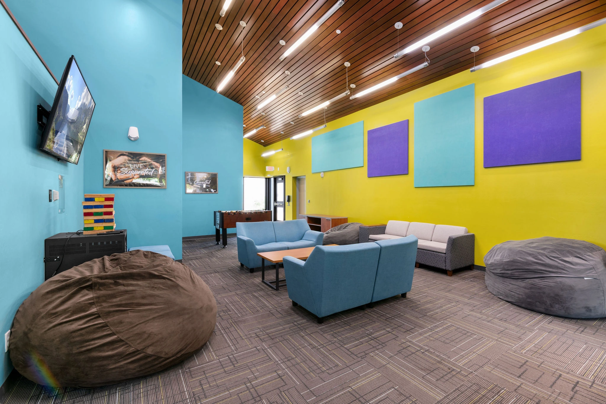 a room with couches and chairs