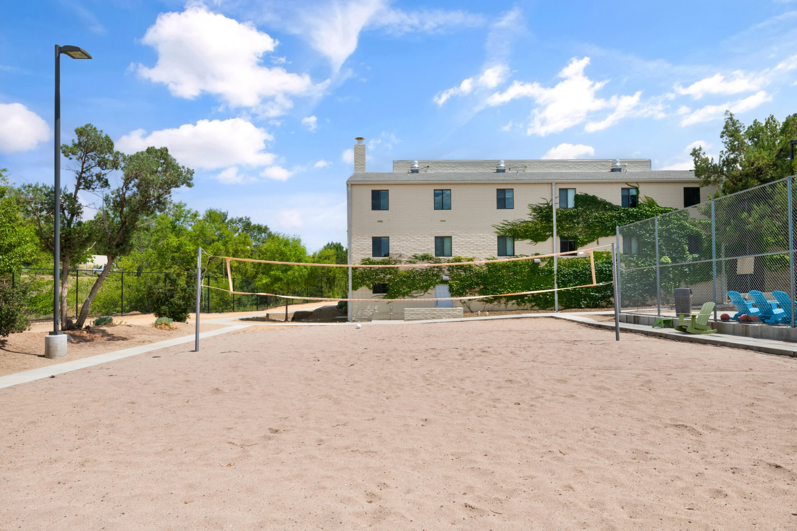 a volleyball court in front of a building