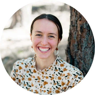 a woman smiling at camera