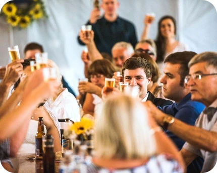 a group of people sitting at a table